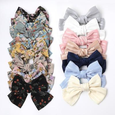 China RARA fabric fashion hair accessories spring summer tied fabric butterfly solid color floral print bow silk oversized hair clip for sale