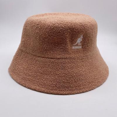 China Flat Surface Khaki Terry Towel Designed Bucket Hat Custom Character Stylish Hot Sale Color Brand Logo Embroidery for sale