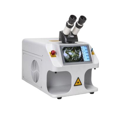 China Economical Custom Design Mini White Metal Laser Welding Machine Easy to Operate and with YAG Spot Welding Mode for sale