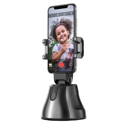 China Adjustable 360 ​​Rotation Camera Video Shooting Auto Facial Tracking Photo Shooting Smart Phone Holder for sale