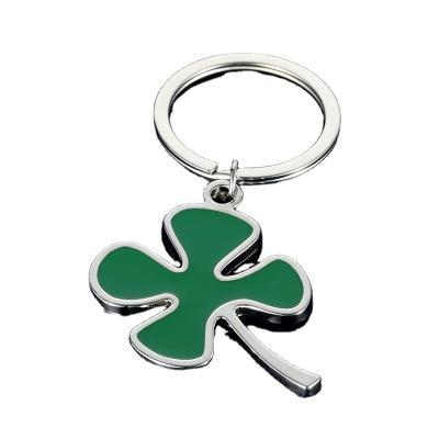 China New Car Green Metal Clover Bag Key Ring Fashion Four Leaf Car Key Chain Pendant Keychain Styling New for sale