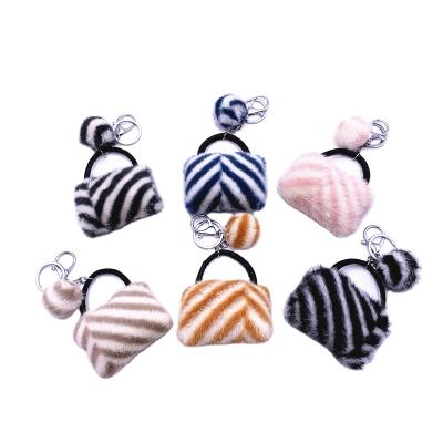 China Faux Fur Ball Pompom Chains New Product Plush Stripe Shape Creative Mini Pompom Bag Plush Wallet Handbag Key Chain Car Pendant Key Ring for sale