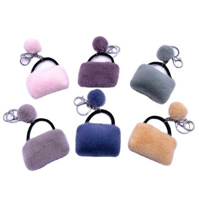 China Faux Fur Ball Pompom Chains New Artificial Imitated Small Car Key Chain Jewelry Pompom Plush Mink Fur Keychain Pompom Bag for sale