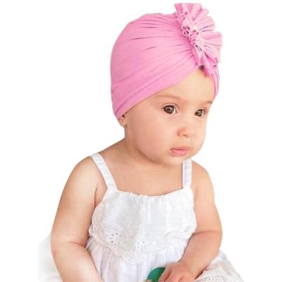 China Plush Dot Baby Girl Hat Soft With Bow Candy Color Baby Turban Hats For Girls Elastic Infant Hat for sale