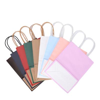 China Recycled Materials Moq 500 Custom Gold Logo Brown White Kraft Paper China Supplier Bags With Handle Rope Ribbon Paper Custom Logo Paper Bag for sale