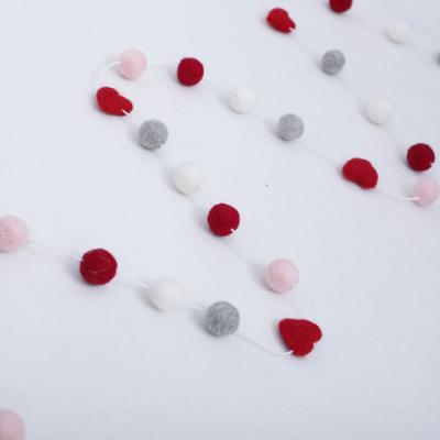 China Wool Felt Top Selling Valentine's Day Decoration 100% Handmade Heart Shape Felt Ball Garland Decoration for sale