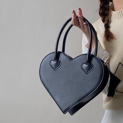 China 2022 Fashion Heart Design Portable Ladies Shoulder Bag Female Retro Small Black PU Leather Handbags Tote Purse For Women Luxury for sale