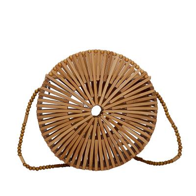 China Fashion 2021 Summer Hollow Around Small Cross - Body Shoulder Tote Purses Handmade Bamboo Bags Women Handbag for sale