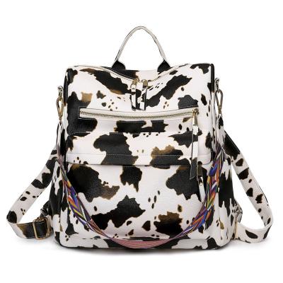 China Waterproof Cow Print Women Backpack Fashion Female Waterproof Animal Prints Ladies Shoulder Backpack Leather Purse for sale