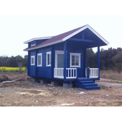 中国 Log cabin motor house wooden house for car traveling with steel base and wheel 販売のため