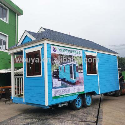 China Prefab wood mobile home trailer caravans tiny house on wheels for sale en venta