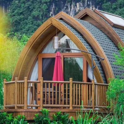 China Prefabricated wooden mini hotel house arched shape boathouse en venta