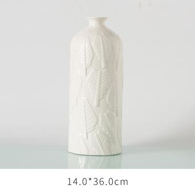 China Traditional Modern White Reactive Matte Color Matte Japanese Style Simple Design Porcelain Ceramic Flower Vase for sale