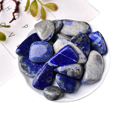 China China wholesale spot heal natural stone lapis lazuli tumbled stone polished meditation stone for aquarium for sale