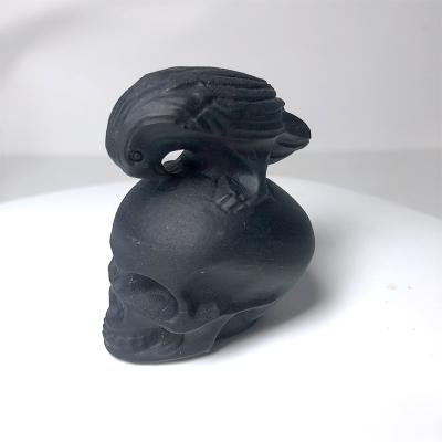 China Natural Obsidian Crow from China Crystal Crafts Hade-Carved Figurine Ornaments Stomped on Skulls for Hallowen for sale