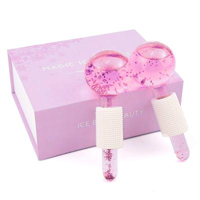 China 2021 Skin Massagers Cold or Hot Globe 2 Pcs Luxury Pink Blue Facial Roller Glass Beauty Massager Ice Globes for sale