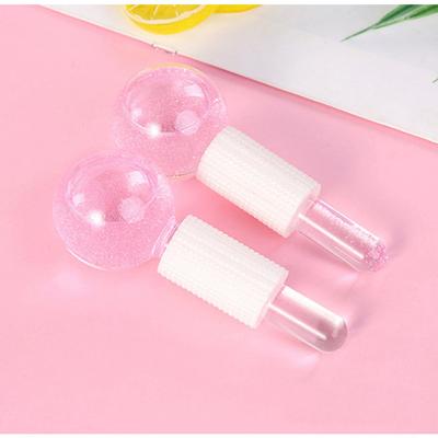 China Skin Massagers Globe Amazon Hot or Cold Top Selling Skin Care 2 Pcs Beauty Magic Ice Roller Facial Globes for sale