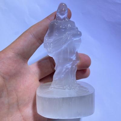 China Wholesale Natural Lucky Crystal Hand Carved Statue of China Calcium Selenite Jesus Astronaut Gypsum Ornaments for sale