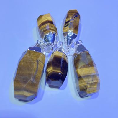 China Mateiral New Arrival Natural Tiger Eye Healing Stone Irregular Engraved Crystal Point Pendants Natural for sale