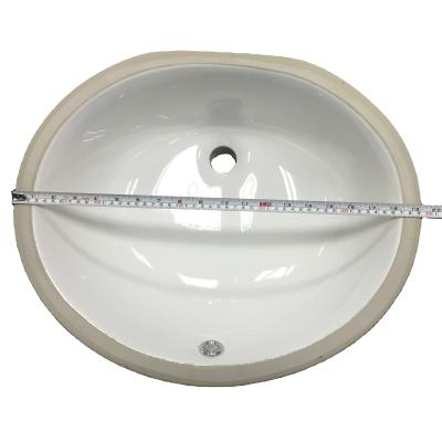 China Factory Price Modern Countertop Sink White Oval Undermount Wash Basin Bathroom for sale