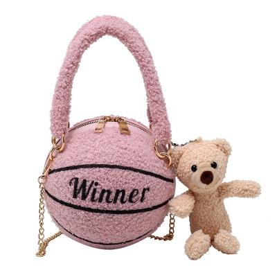 China New plush winter fashion trend MINI small round one-shoulder messenger street basketball bag female bag for sale