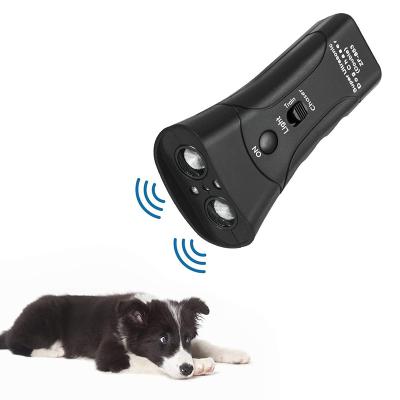 China Ultrasonic Handheld Dog Repellent Infrared Stocked Dog Deterrent 3 In 1 Pet Trainer With Flashlight Anti Barking Device for sale