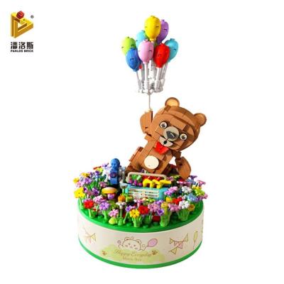 China DIY 569pcs Panlos Brick PANLOS 656010 Flying Bear Building Music Box Building Block Balloon House Model for sale