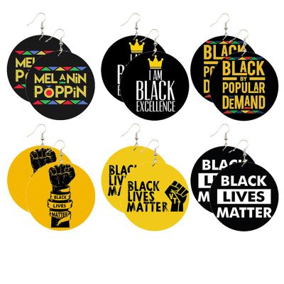 China FASHIONABLE factory direct sales exaggerated wooden letter print black lives matter earrings for sale