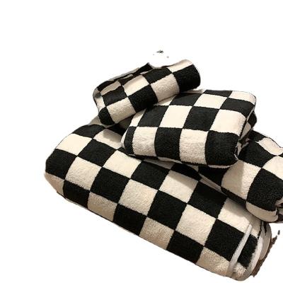 China Checkerboard Sofa Blanket Double Layer Spring Summer Coral Velvet Super Soft Blanket for sale