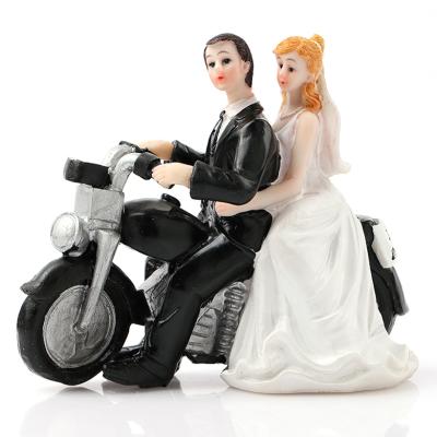 China EU& Custom America couple ride motorclyce sculpts lover figurine decoration for cake house new home wedding valentine gift for sale