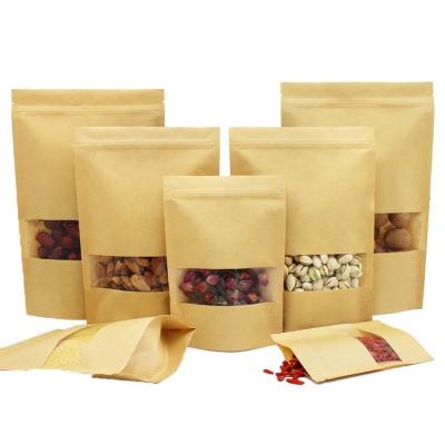 China Moisture Proof Stand Up Brown Kraft Paper Bag With Window Kraft Paper Zipper Packaging Bags For Food Tea for sale