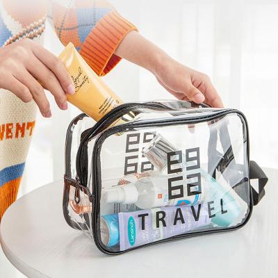 China Durable PVC Transparent Waterproof Beach Cosmetic Bag Clear PVC Travel Makeup Bag for sale