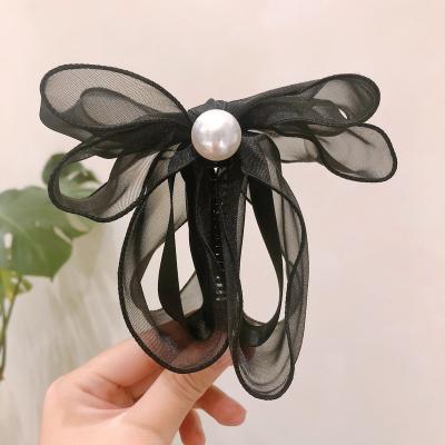 China Yiwu New Style Pearl Tulle Ribbon Bow Banana Eco-friendly Material Hair Clips For Girl Wholesale for sale