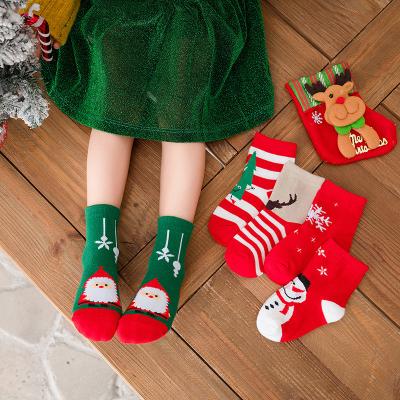 China Latest Design 5pairs/bag Kids Christmas Antibacterial Baby Cartoon Socks Long Red Cotton Sock for sale