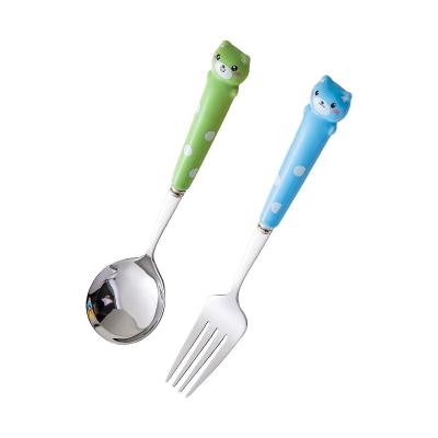 China Cute Creative Stainless Steel Spoon Viable Ceramic Cartoon Handle Fork For Kids for sale