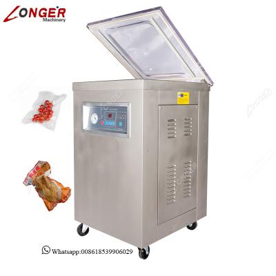 China Food Vertical Chicken Dates Tea Vacuum Vacuum Packing Packing Machine for sale