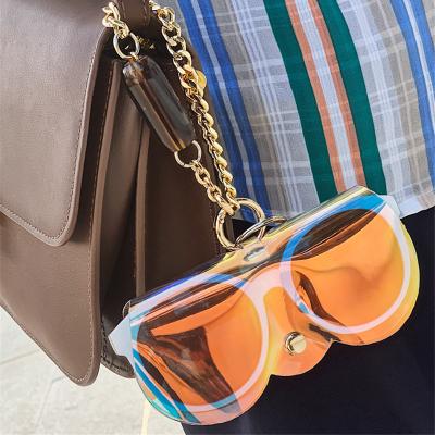 China 2022 Fashion PVC Laser Glasses Case With Metal Chain Popular Transparent Women Sunglasses Cover Sun Glass Bags for sale