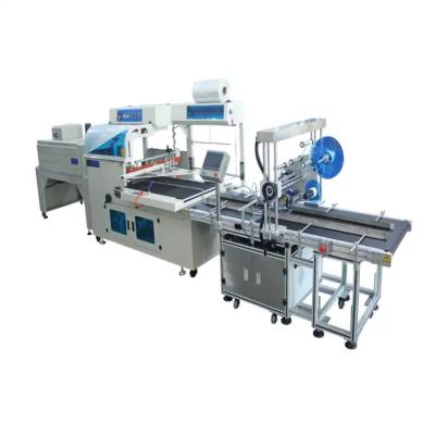 China PVC Film Seal Wrap Machine Voltage 220V Heat Shrink Tunnel Machine for sale