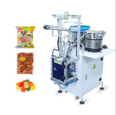 China Small Gummy Candy Packaging Machine Confectionery Chewing Gum Packaging Machine Lollipops Candy Bar Packaging Machine for sale