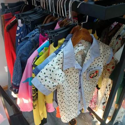 China Second-Hand Clothing International Second-Hand Clothing Tops International Grade Used Clothes Kids Shirts Dress Skirts In Bullets Second-Hand Clothing for sale