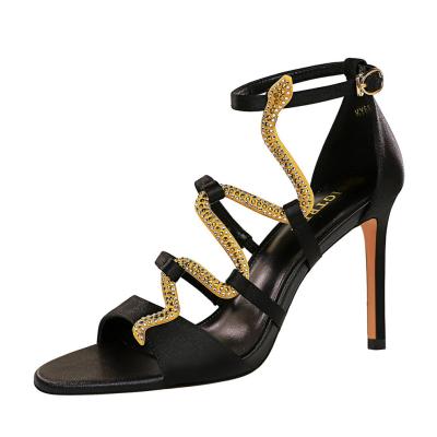 China 2021Sexy Nightclub Breathable Satin Rhinestone Women Hollow Snake Shaped High Heels for sale