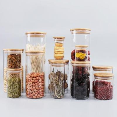 China Cover ware sealed air tight glass jar with bamboo lid for sale