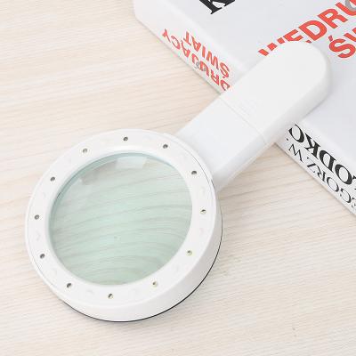 China Handheld Magnifier 12 Lights 30x Reading Magnifier Led Optical Glass High Magnification Reading for sale