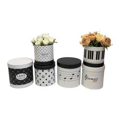 China Recycled Materials Ready To Ship 3pcs Custom Printing Paper Cardboard Round Wedding Gift Black Rose Flower Box With Lid Luxury Gift Packaging for sale