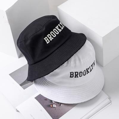 China Fashionable Black And White Image Letter Printer Bucket Hat Bucket Hats for sale