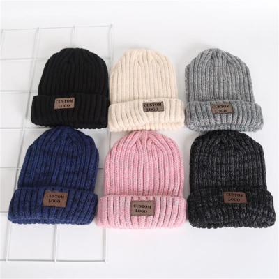 China JOINT Fashion Knitted Hats Winter Beanies Custom Logo Label Mens Womens Beanie Hats for sale