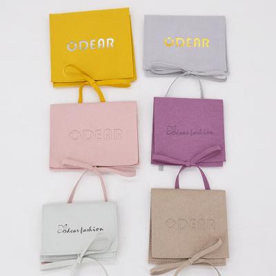 China Eco-friendly Luxury Custom Small Suede Gift Envelope Velvet Jewelry Packaging Bag Jewelry Pouch With Logo for sale