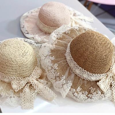 China Image Flofallzique 2020 Summer Breathable Lace Bowknot Sunshade Sunscreen Babies Hat For Beach Outdoor Activities Outing for sale