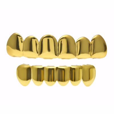 China Top and Bottom Dental Teeth Grillz Gold Hiphop Body Jewelry Cosply Halloween Vampire Tooth Teeth Grillz Hiphop Tooth Caps for sale