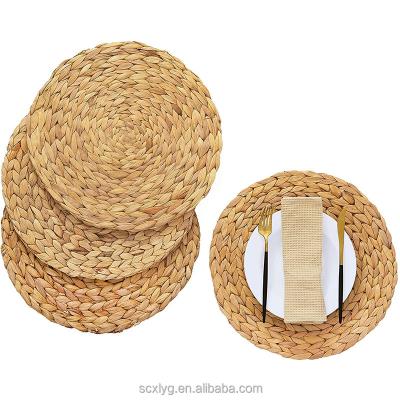 China Handwoven Weave Water Hyacinth Area Rug Sustainable Grass Round Color Natural Place Mat for sale